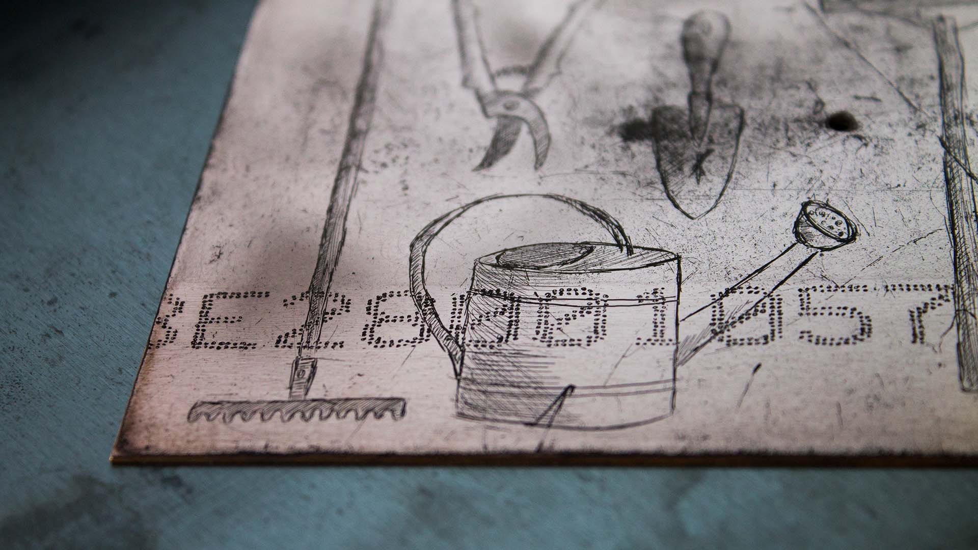Gravure printing – Copperplate with engraved gardening utensils